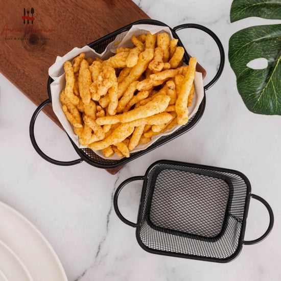 Matte black wire fry serving basket with fine mesh body and dual side handles for tabletop appetizer presentation