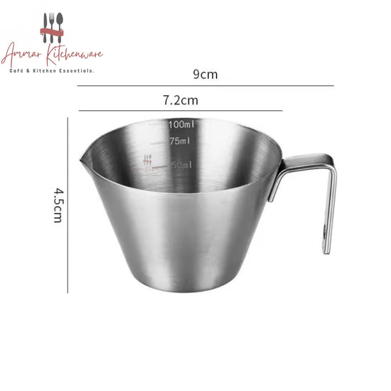 Stainless steel espresso measuring cup 100ml with handle and pouring spout showing internal volume markings