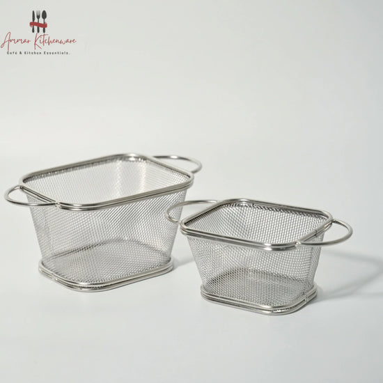 Round corner fry serving basket with wire mesh body, curved edges, and dual side loop handles on dining table