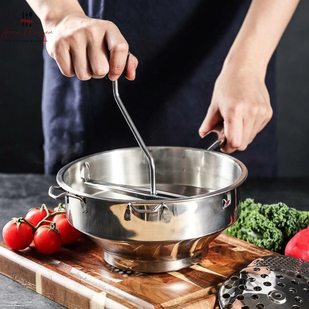 Stainless steel food mill with rotary hand crank and three interchangeable perforated milling discs