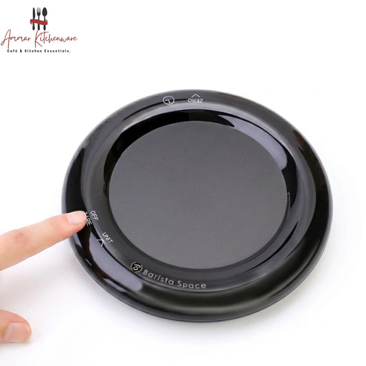 Barista Space mini drip digital coffee scale with integrated timer in round black design on coffee bar setup