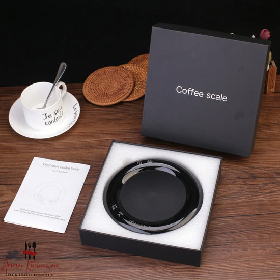Barista Space mini drip digital coffee scale with integrated timer in round black design on coffee bar setup