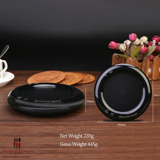 Barista Space mini drip digital coffee scale with integrated timer in round black design on coffee bar setup