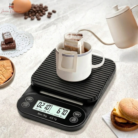 Black espresso digital coffee scale showing dual LCD display with timer and weight readout