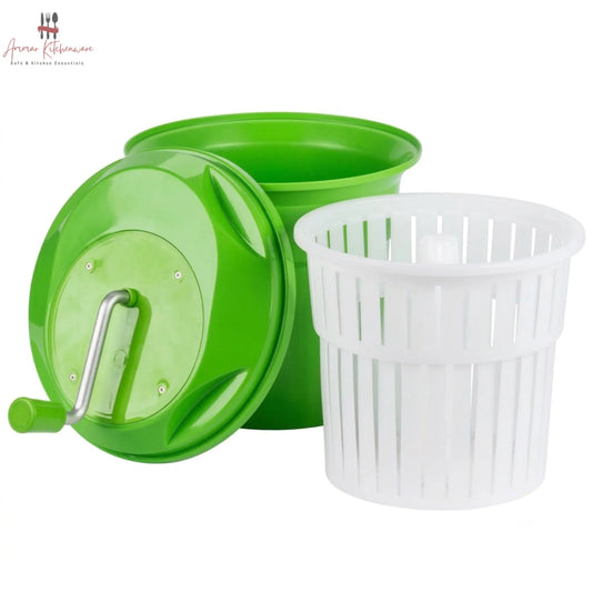 Commercial green salad spinner with metal hand crank arm and white inner colander basket