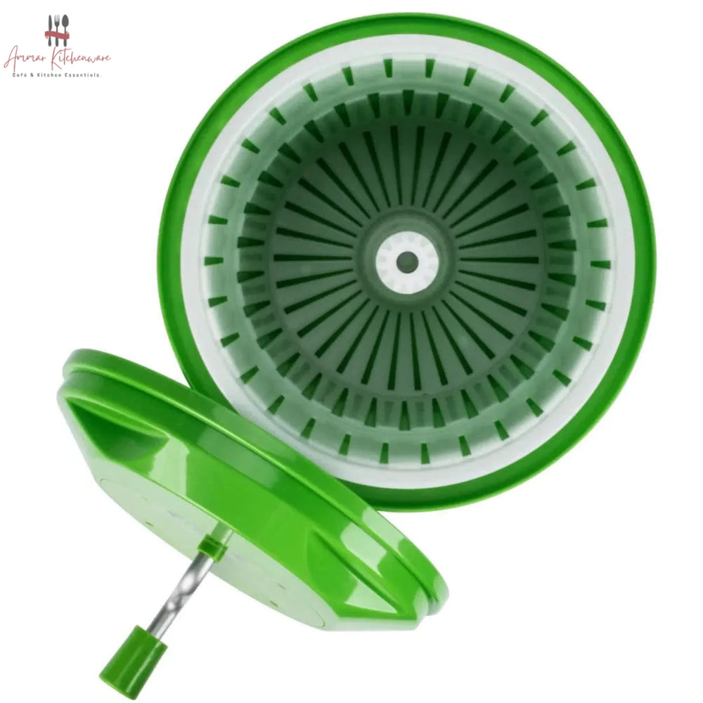 Commercial green salad spinner with metal hand crank arm and white inner colander basket