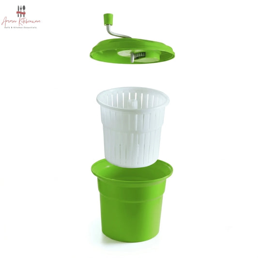 Commercial green salad spinner with metal hand crank arm and white inner colander basket