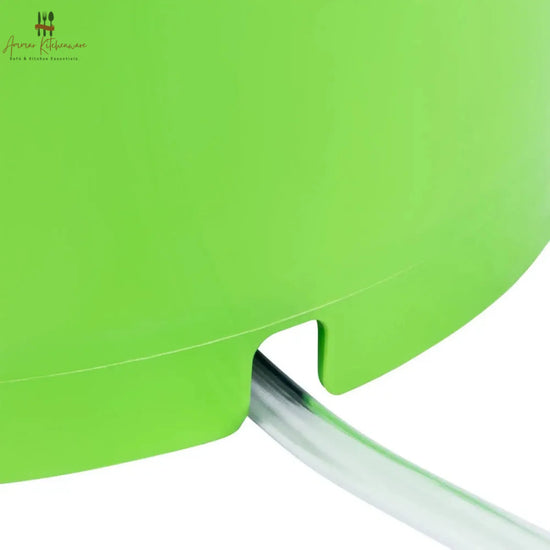 Commercial green salad spinner with metal hand crank arm and white inner colander basket