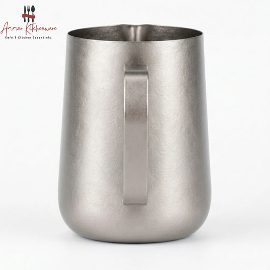 Barista Space 600ml pure titanium milk frothing pitcher in silver with precision long-tip spout and hexagonal handle